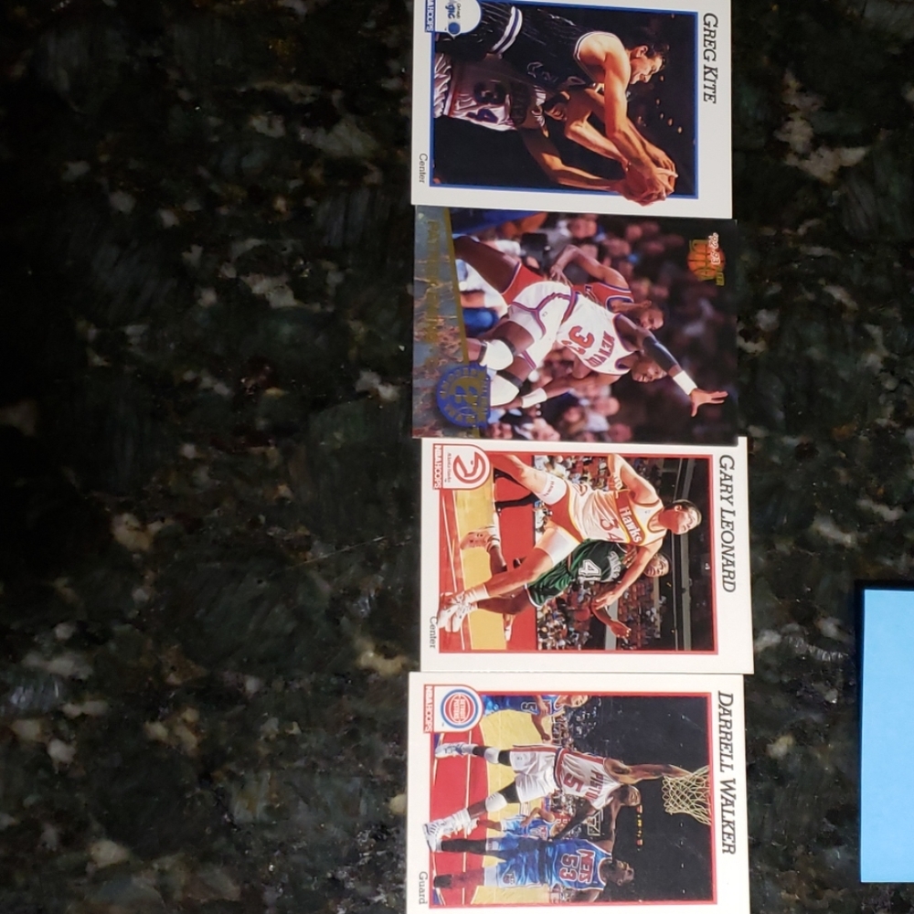 Lot of 4 Basketball Cards
